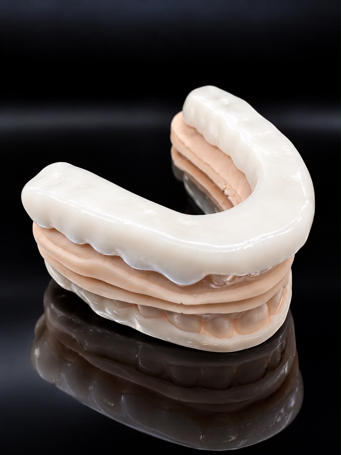 White Nylon Mini FM sleep appliance on dental models, viewed from above
